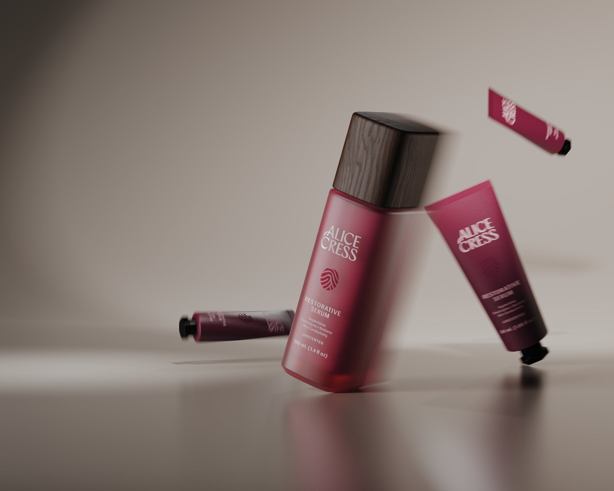 Alice Cress Restorative Serum bottle and tubes in motion