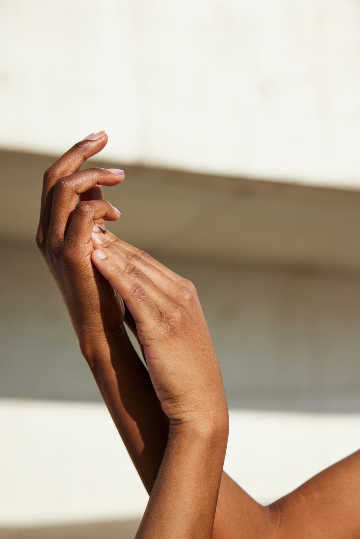 Alice Cress serum applied to the back of a hand
